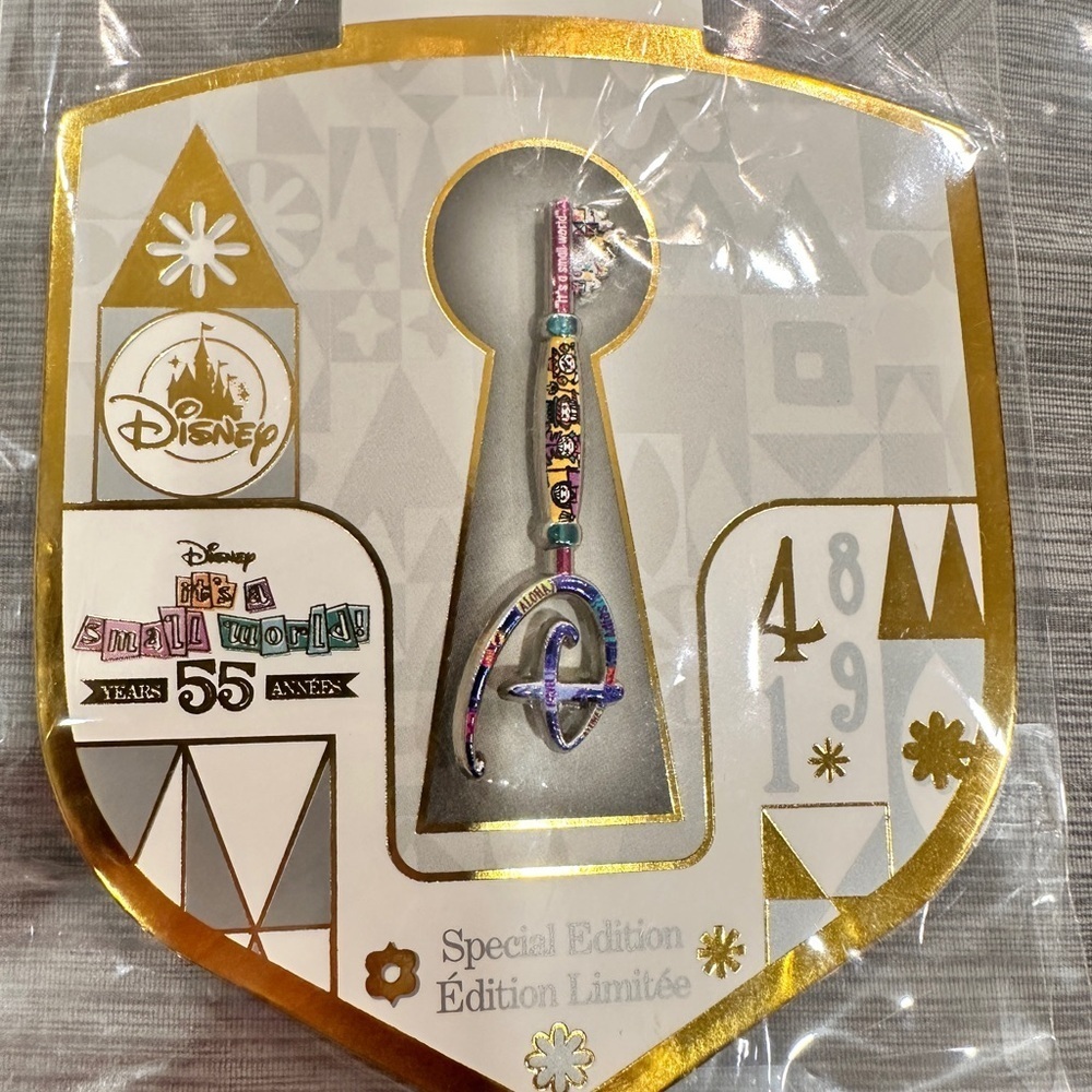 "It's a Small World" Disney Gold and Purple Special Edition Key -NWT